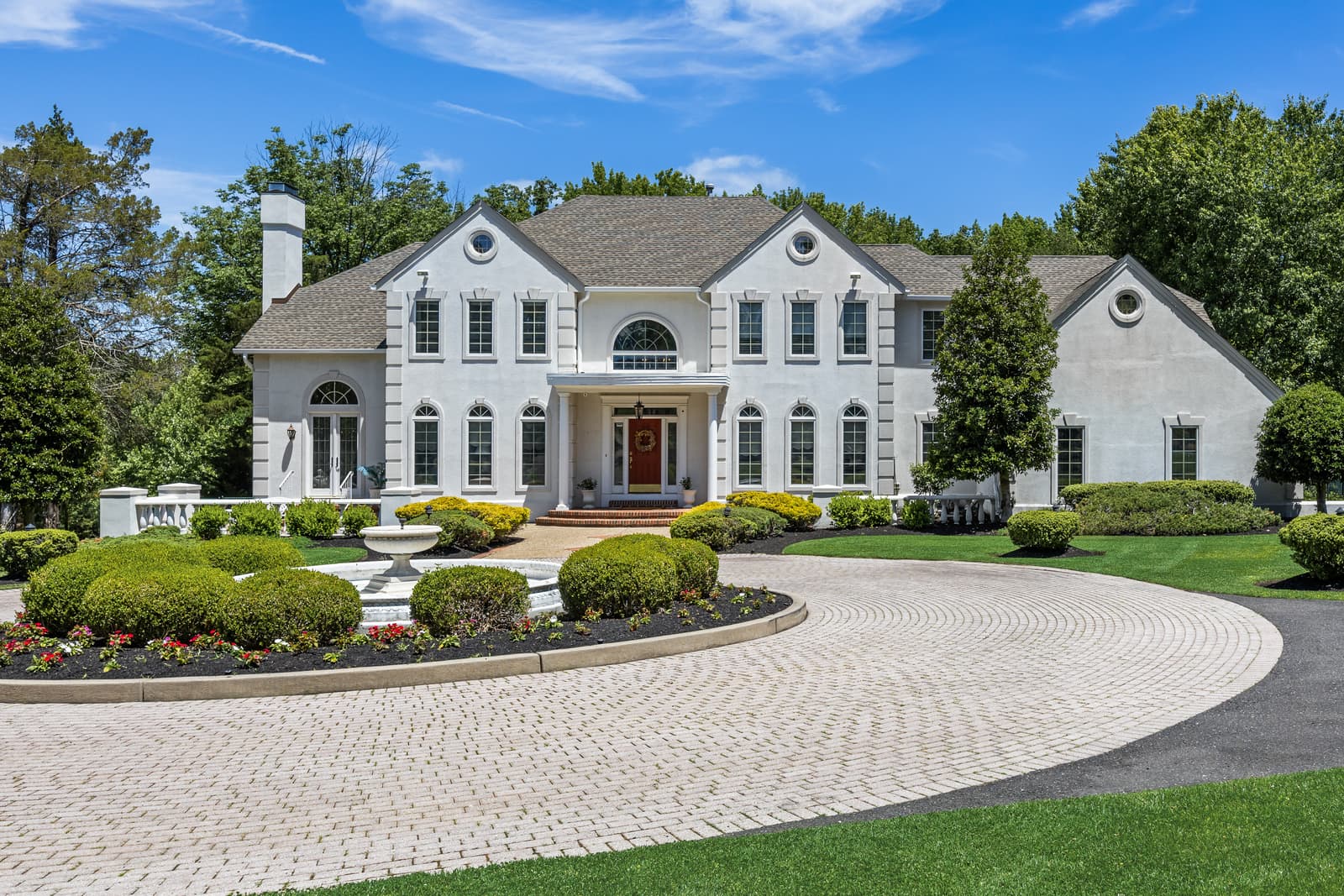 Real estate photography of a white colonial estate in Cherry Hill, NJ