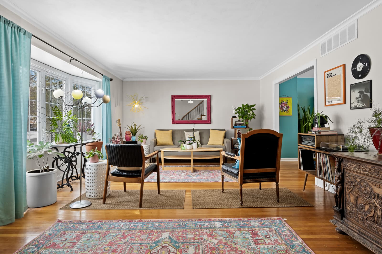 Living room with layered decor and rich color in Cherry Hill, NJ