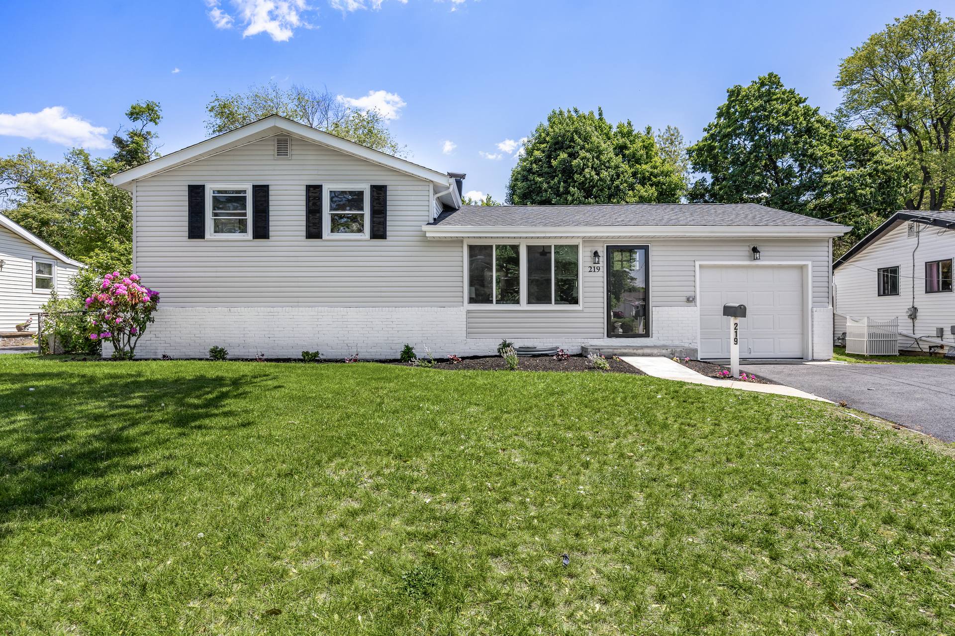 Front exterior of a split-level home in Deptford, NJ