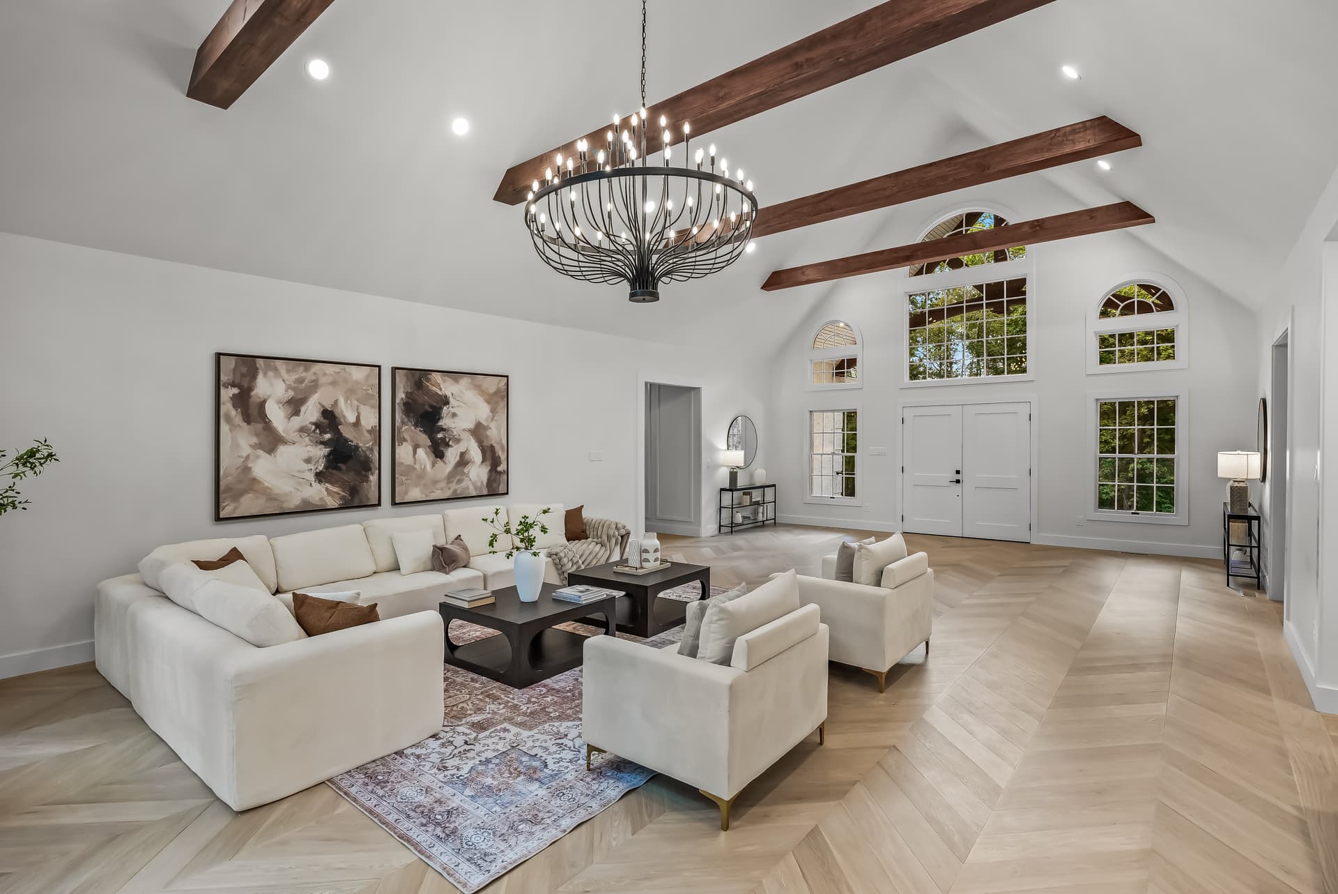 Vaulted living room with exposed beams in a Moorestown home