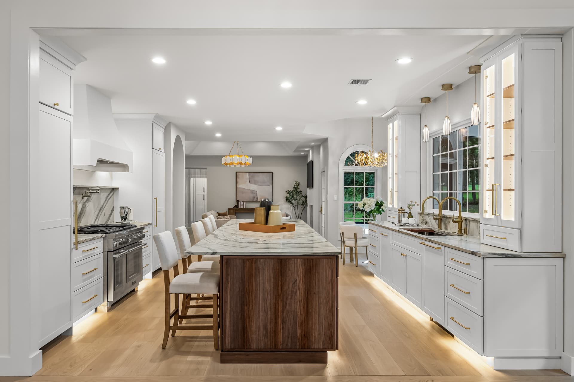 Chef's kitchen with a large island and professional range in a Moorestown home