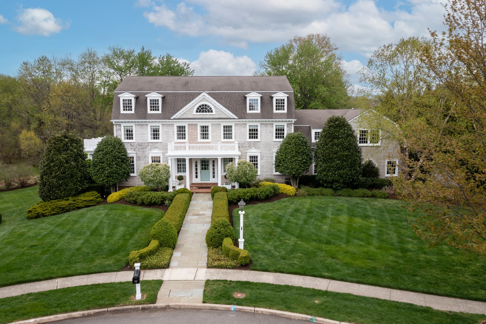 Front exterior of a center-hall colonial home in Moorestown, NJ